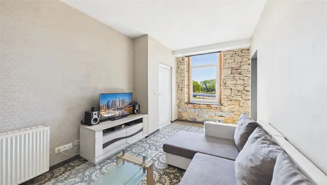 Appartement te koop in Courrière – 1/10